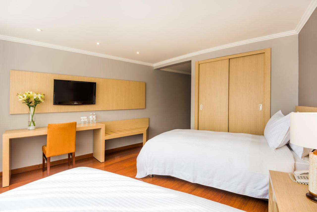 Cosmos 100 Hotel & Centro De Convenciones - Hoteles Cosmos Bogotá Eksteriør billede A room at the hotel